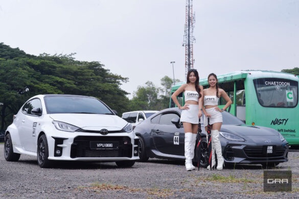 GR Yaris and BRZ with umbrella girls at GRA event