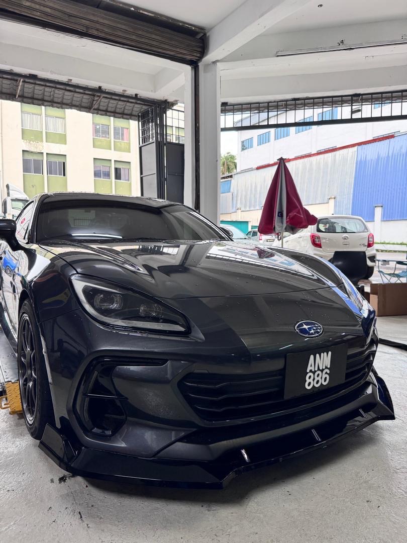 MX-5 parked at night with atmospheric lighting